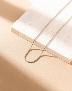 Silver stainless steel snake chain necklace for women with a polished minimalist design